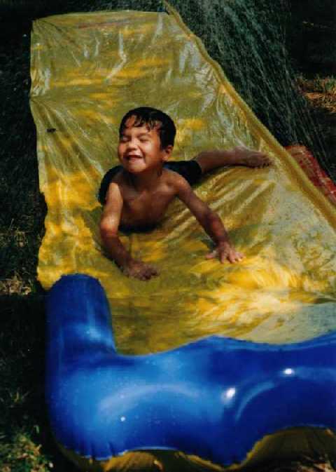 August 9, 2003. Alexander on the Slip N' Slide.