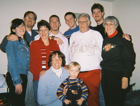 Mom and I in front. In back, l to r: Kathy, Dad, Liz, Chris, Kevin, Grandpa, Mark, Grandma