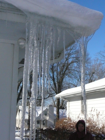 Grandmommy Shirley checks out the icicles, Dec. 2009